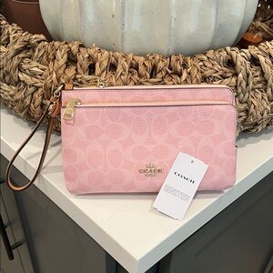 NWT Coach Double Zip Wristlet in power pink color..